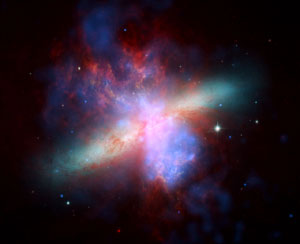 Image composite de M 82 à partir d'images acquises par Hubble , Chandra et Spitzer